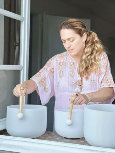 Woman with singing bowls