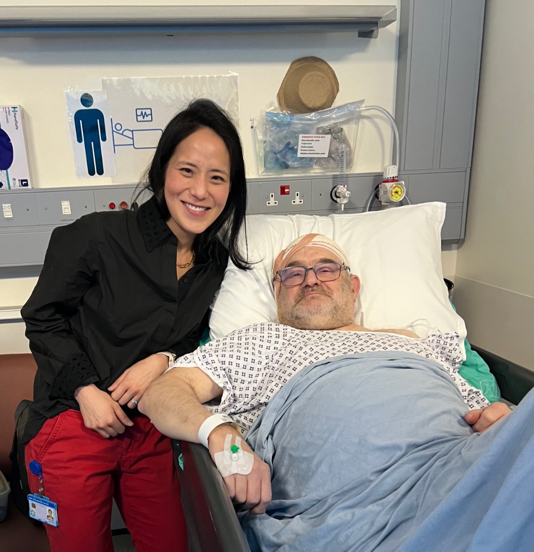 Carol next to patient