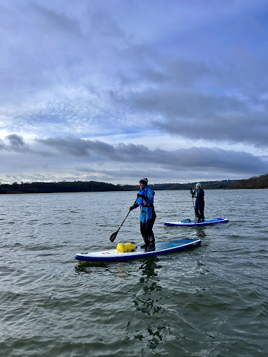 paddleboarding on cloudy day