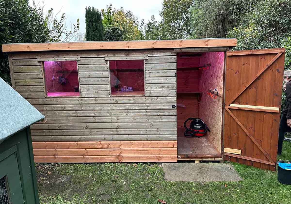 Dark brown wood shed 2