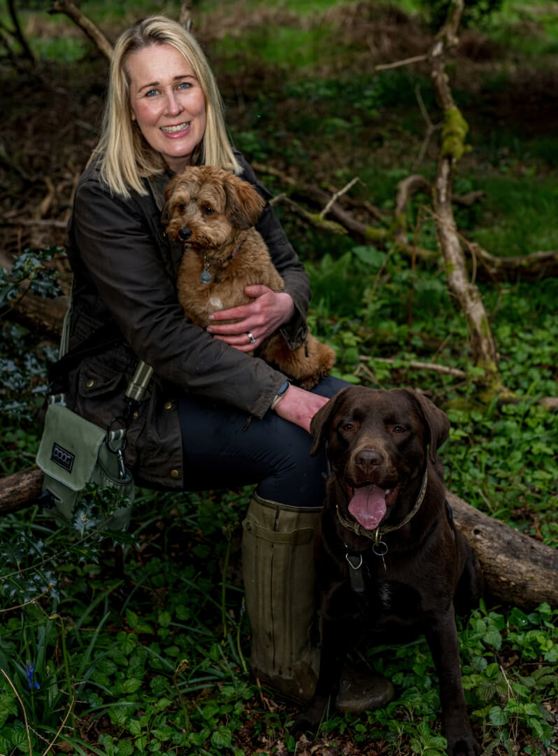 Claire sitting with dogs