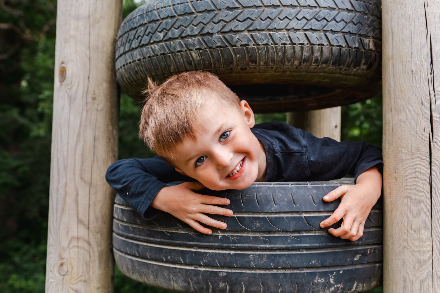 Child in tyres