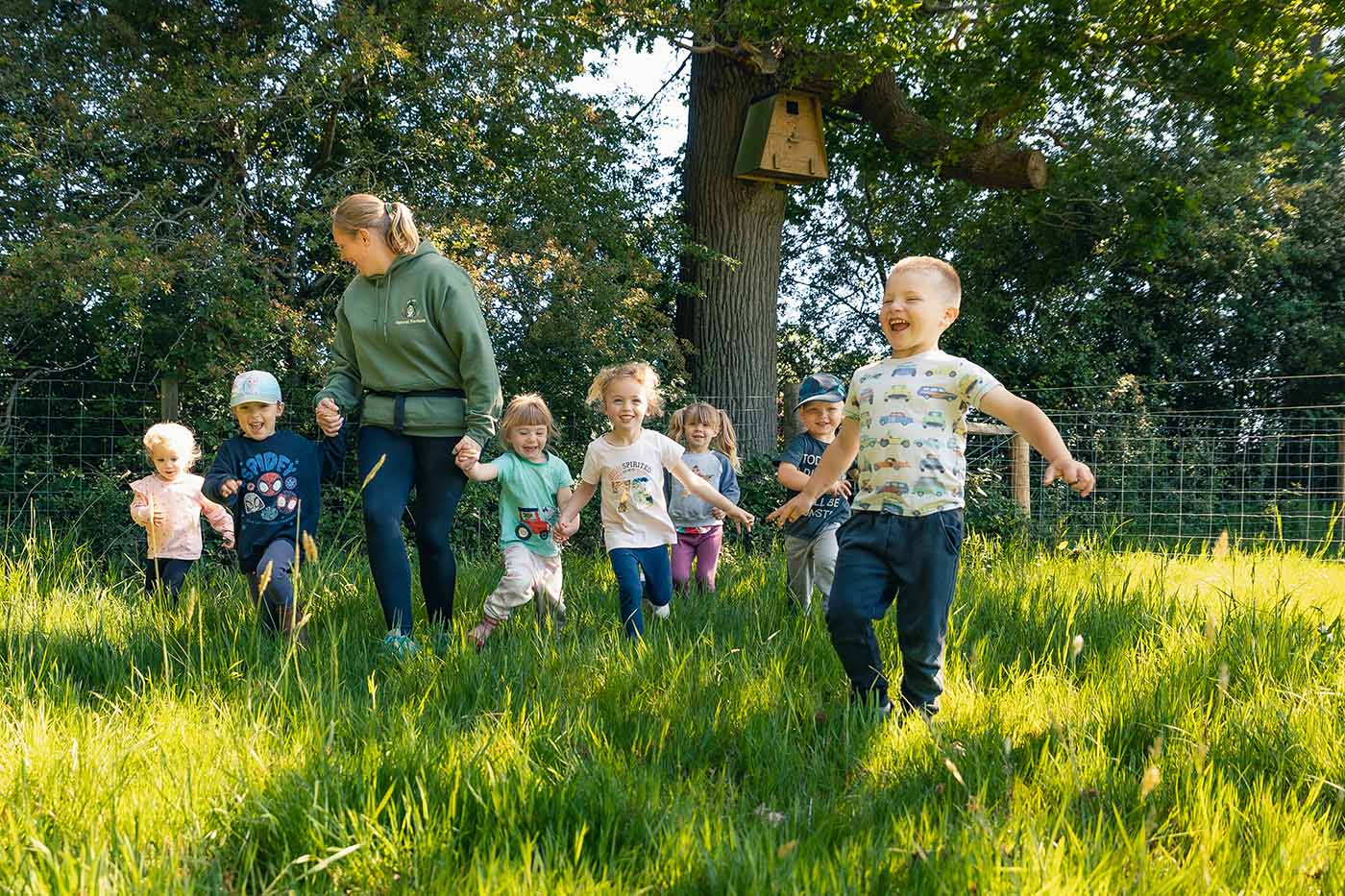 Children running with a woman 3