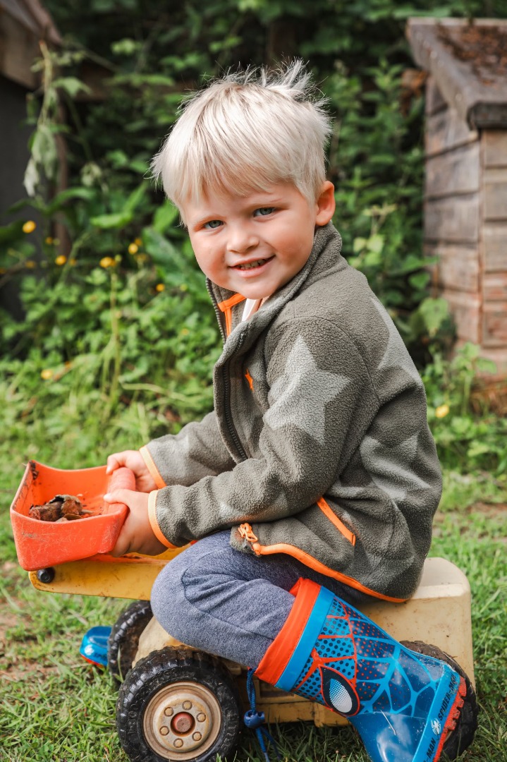 Young boy on digger