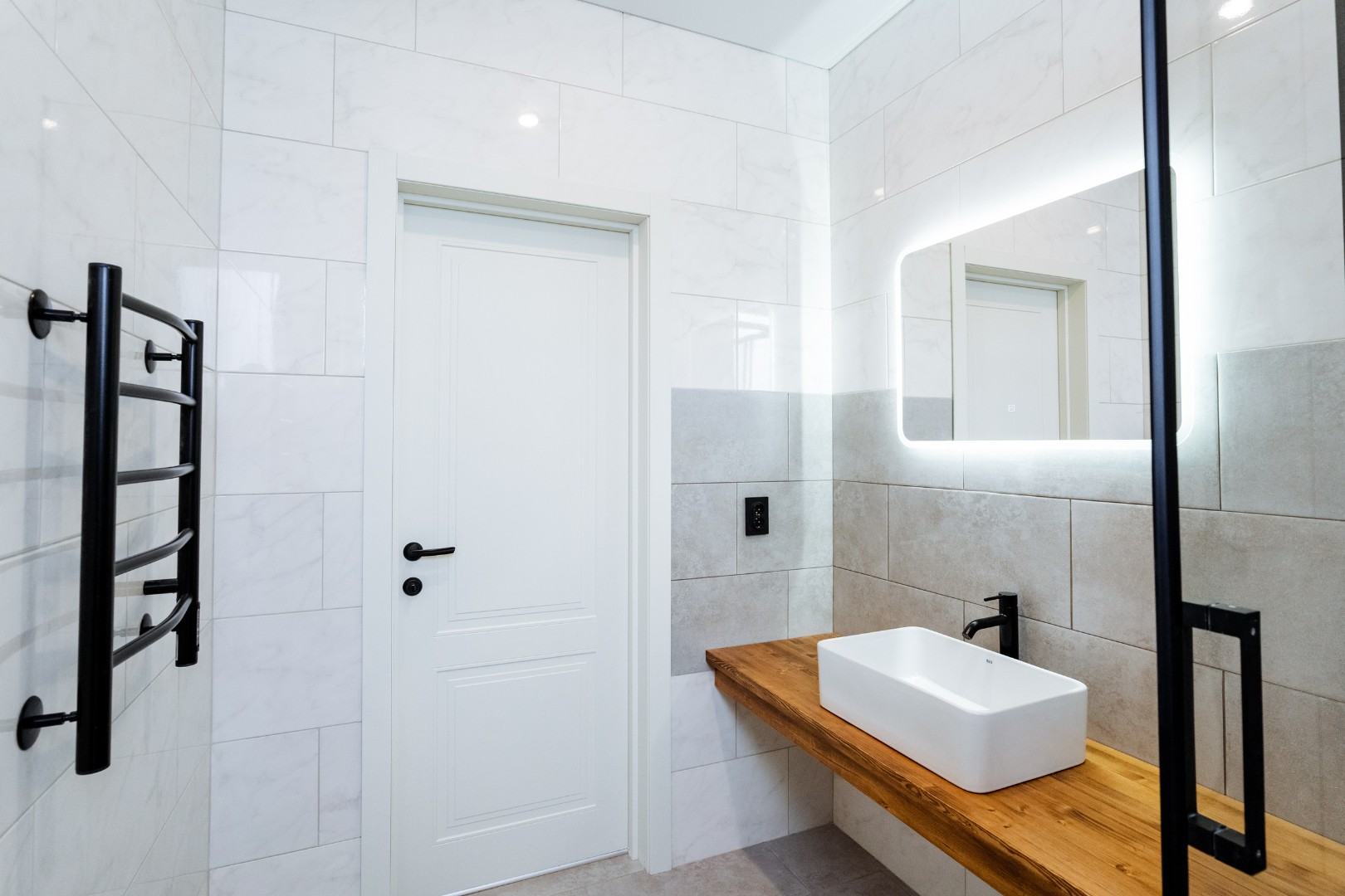 White bathroom with black elements
