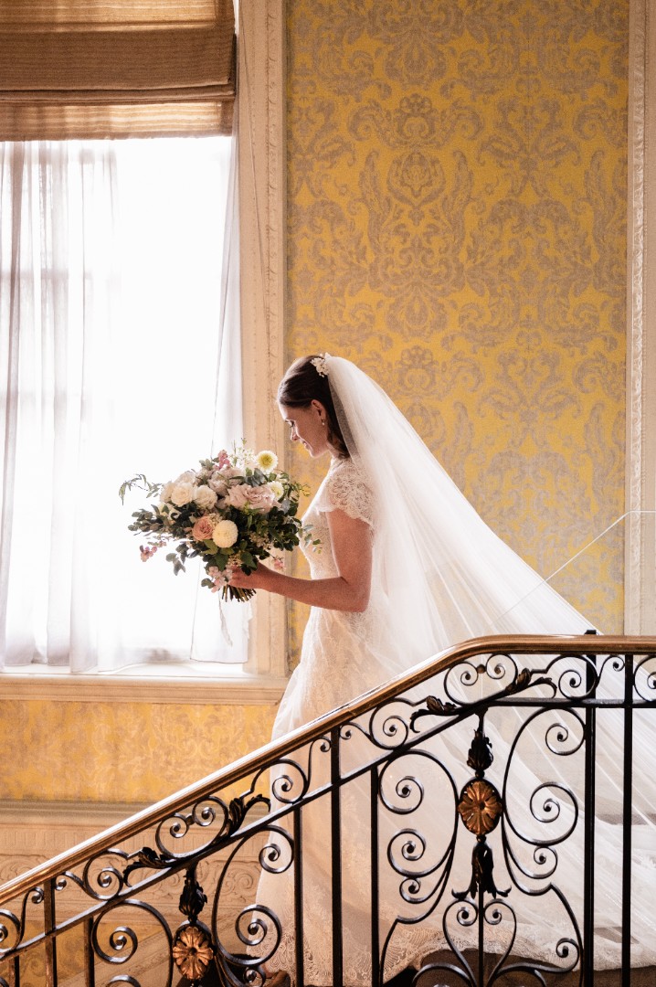 Bride walking down steps