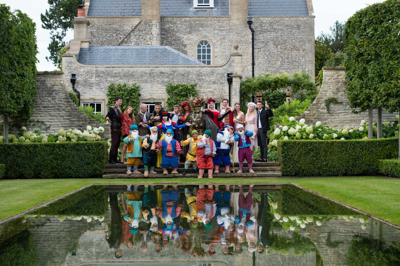 Many dwarves with people