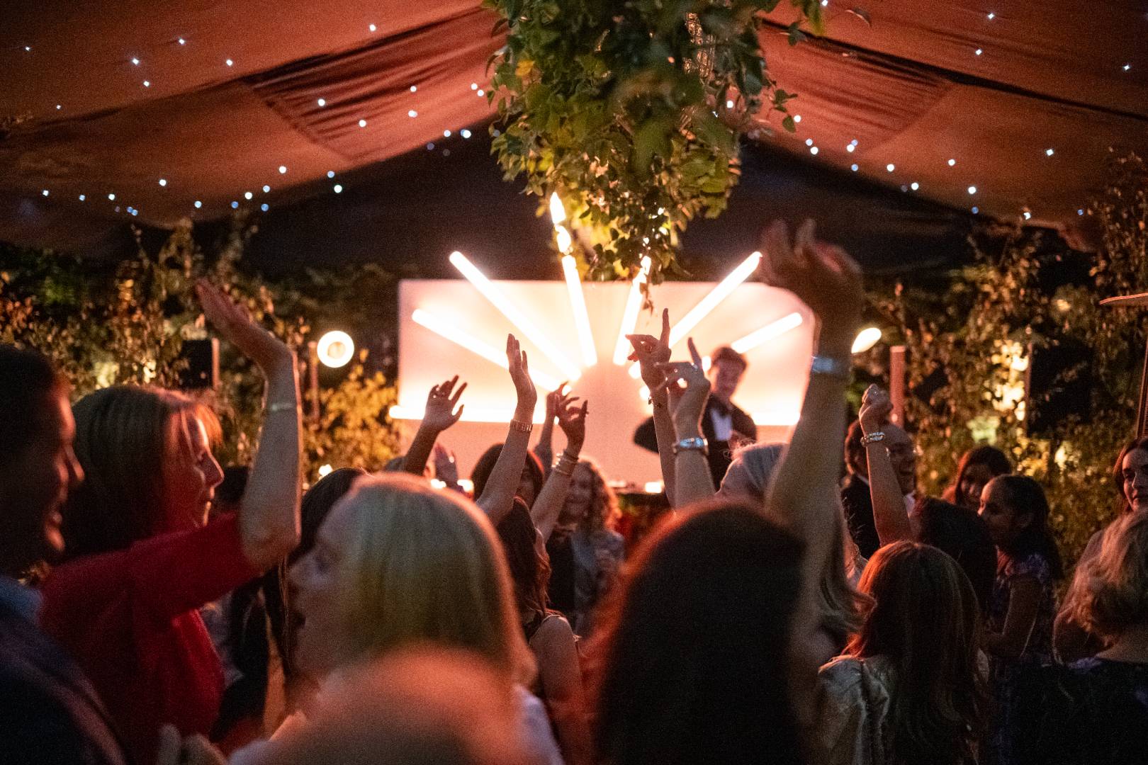 People dancing infront of small stage