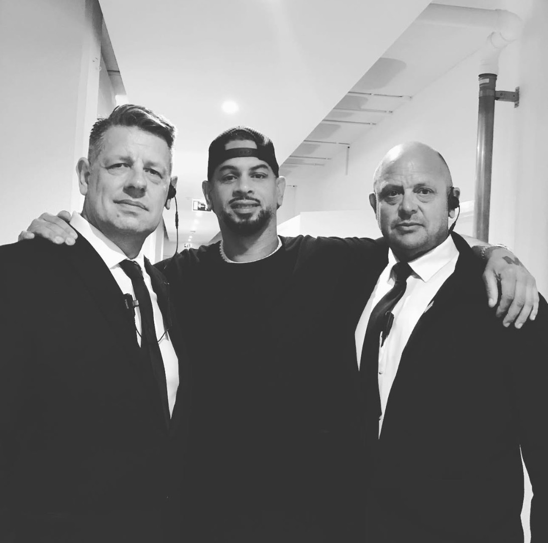 Staff with famous person