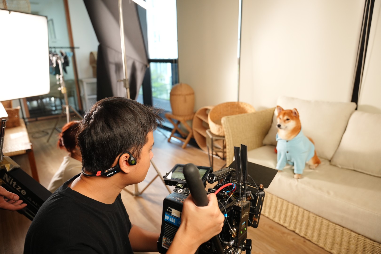 Man creating video with dog