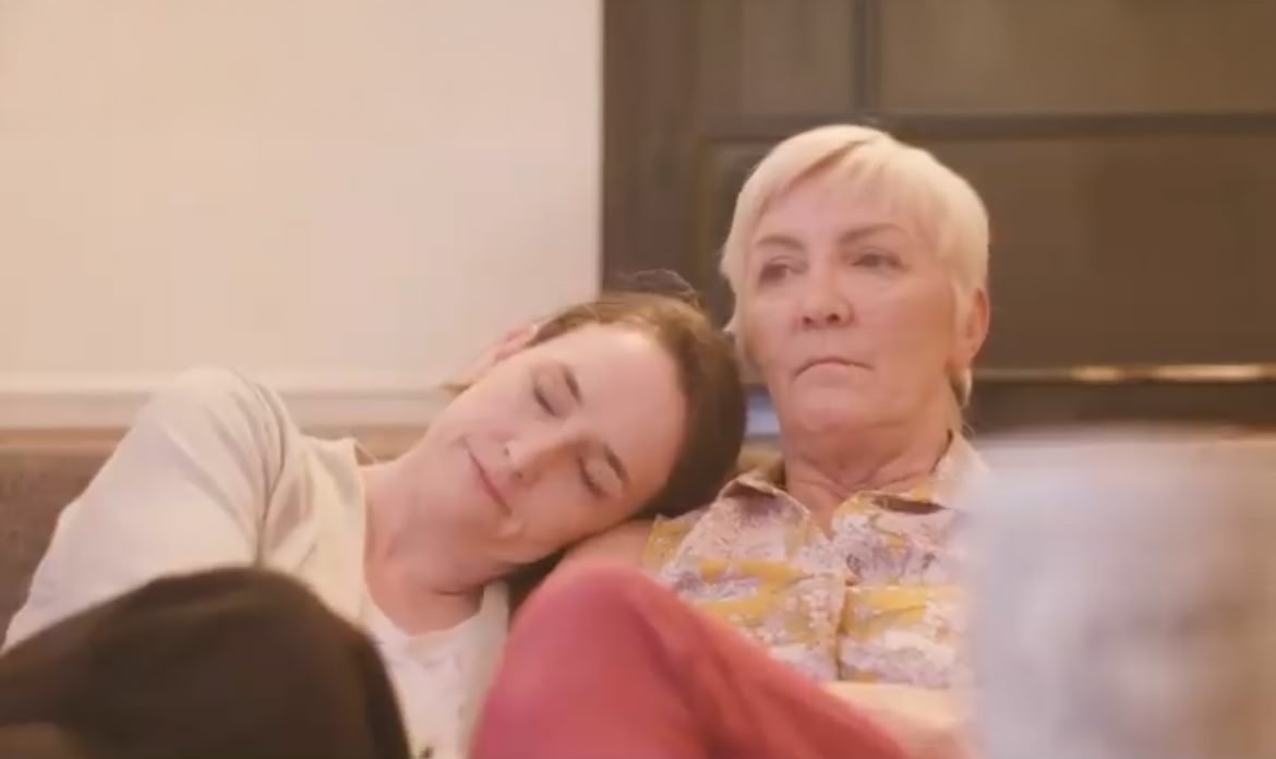 women sitting on the sofa