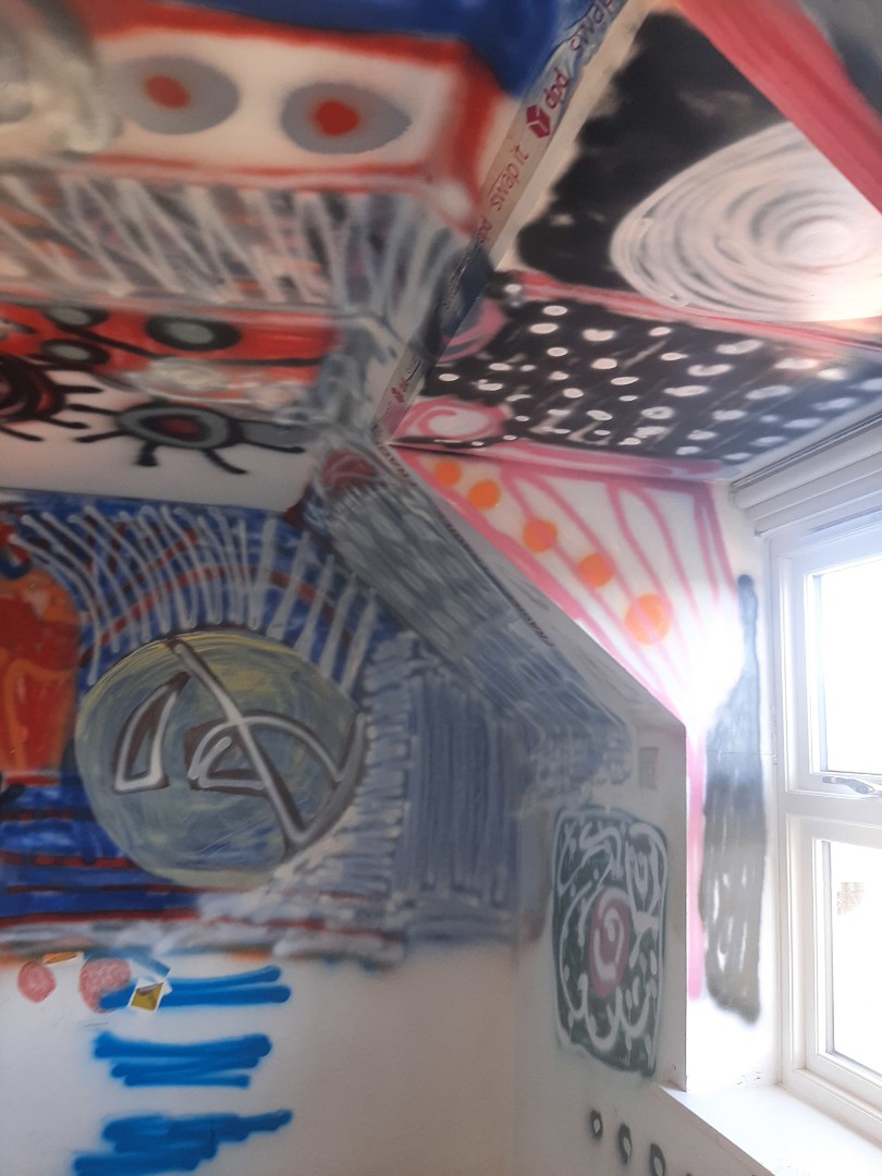 Graffitied room corner