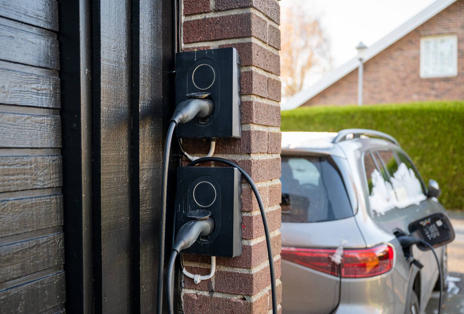 Ev charging unit plugged into car