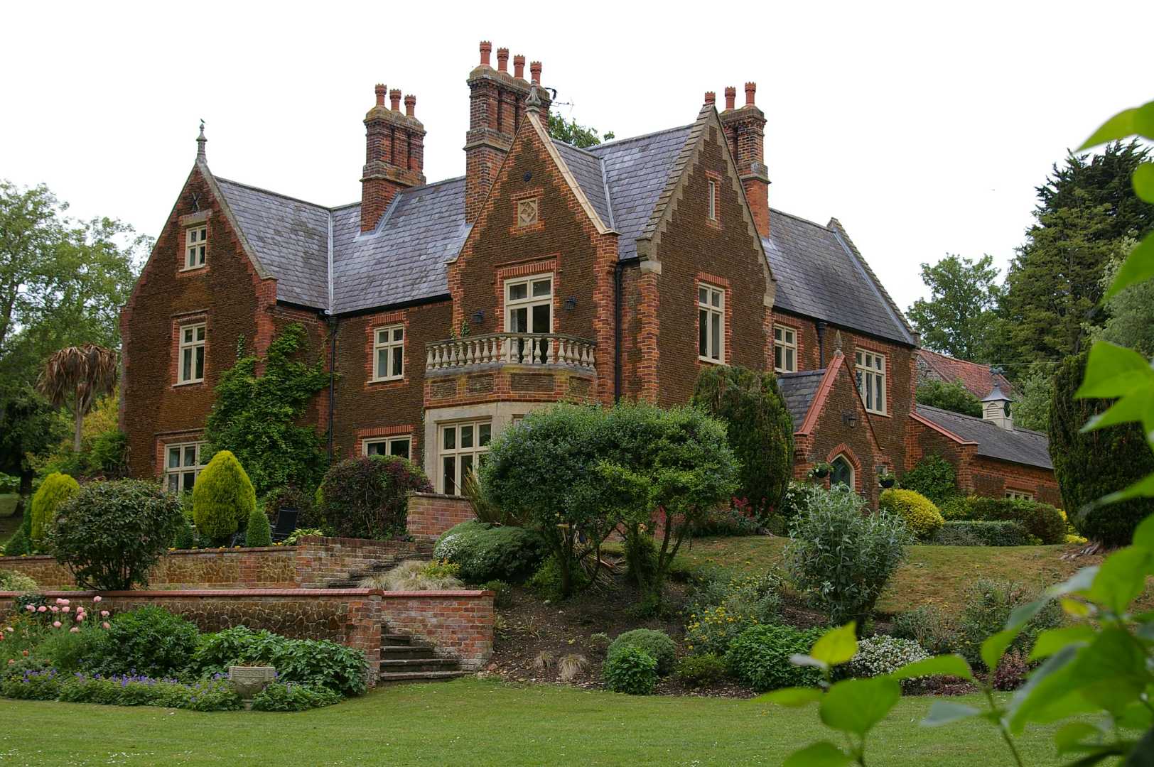 Manor house surrounded by gardens