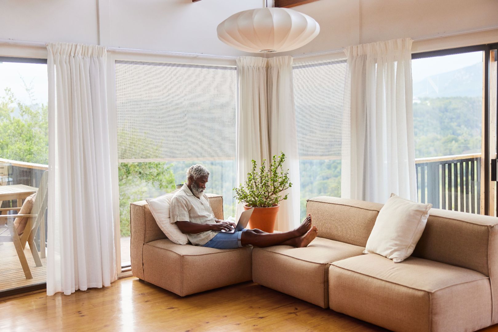 man working on the sofa