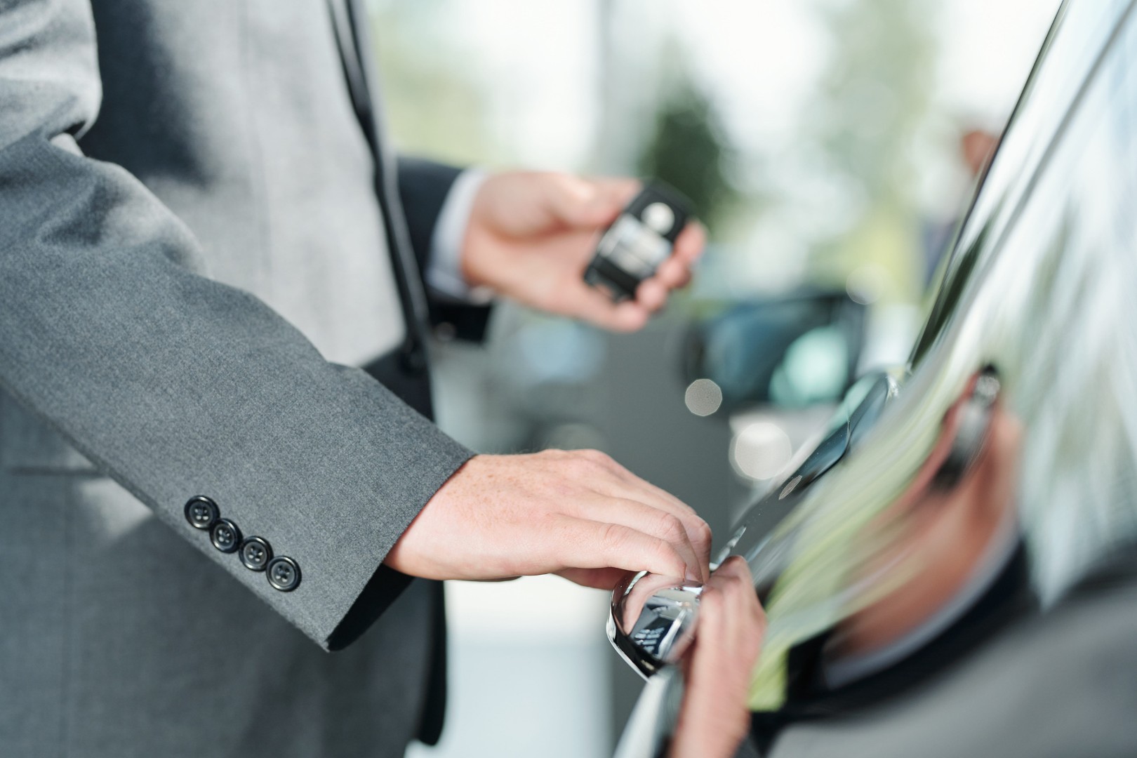 Man open the door of vehicle