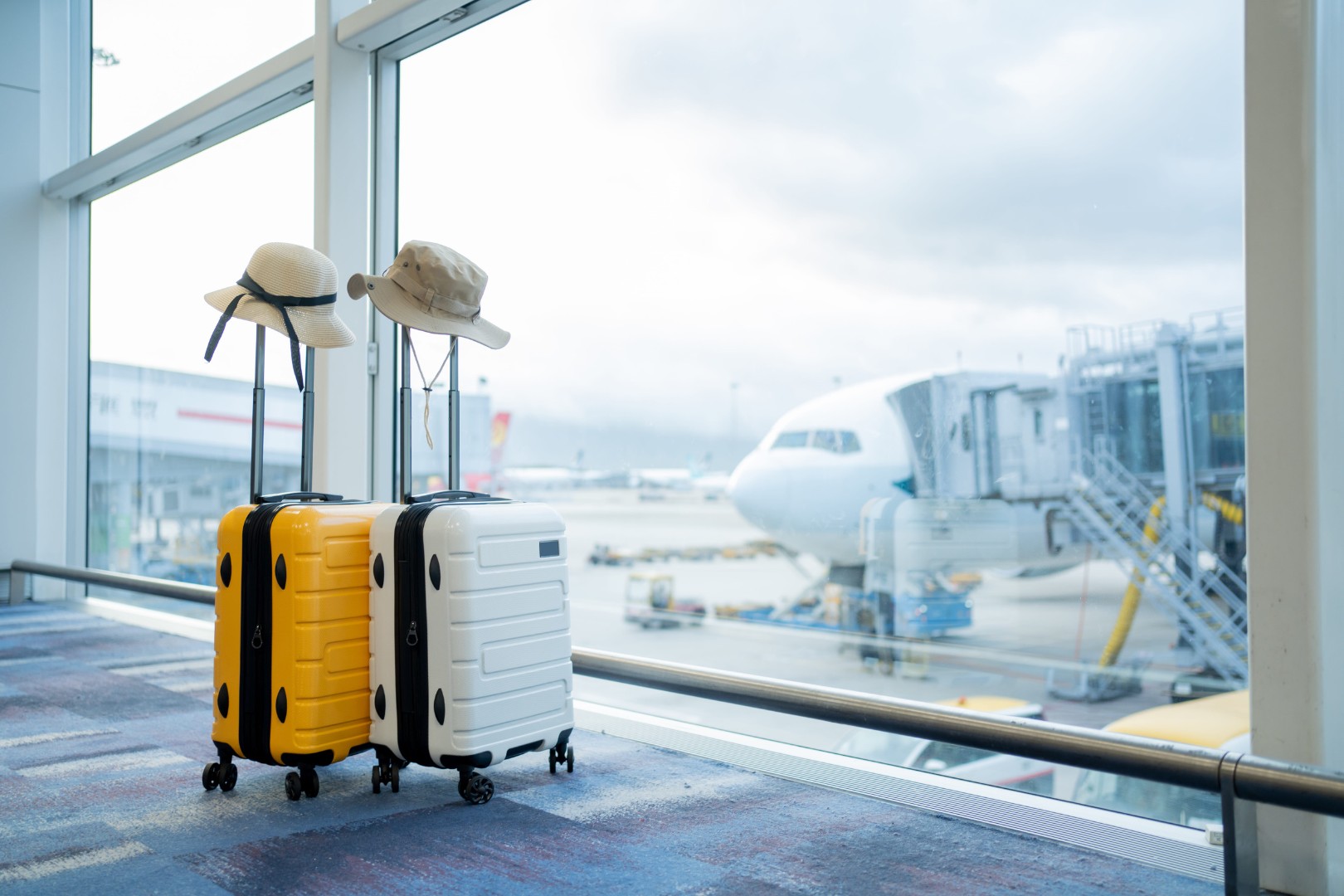 Two suitcases in an empty airport