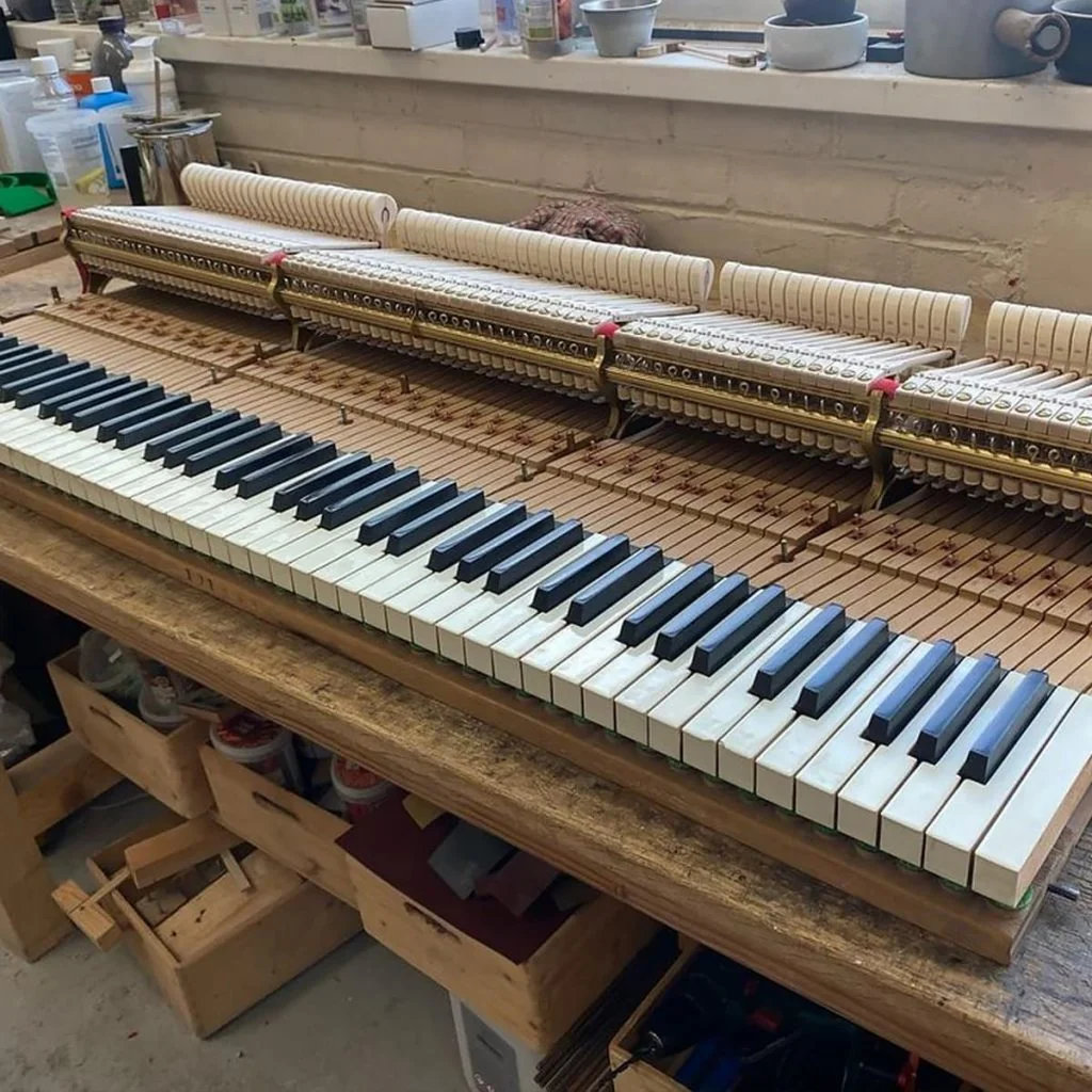 Steinway O piano being rebuilt