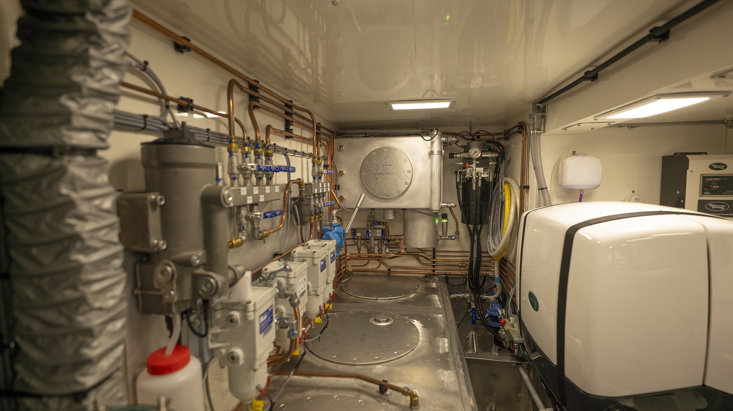 This image shows the fuel system design in the engine room beneath the pilothouse deck of the yacht Alvorada which is designed for blue water and polar cruising. 