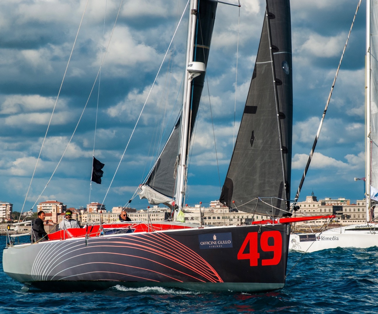 A proven offshore race yacht, Class 40 Akilaria RC1 designed by Marc Lombard is for sale. Pictured preparing for racing in the Mediterranean she is compliant with Vintage category in Class 40 races. Suitable for offshore racing campaigns or as a robust, fast  cruiser