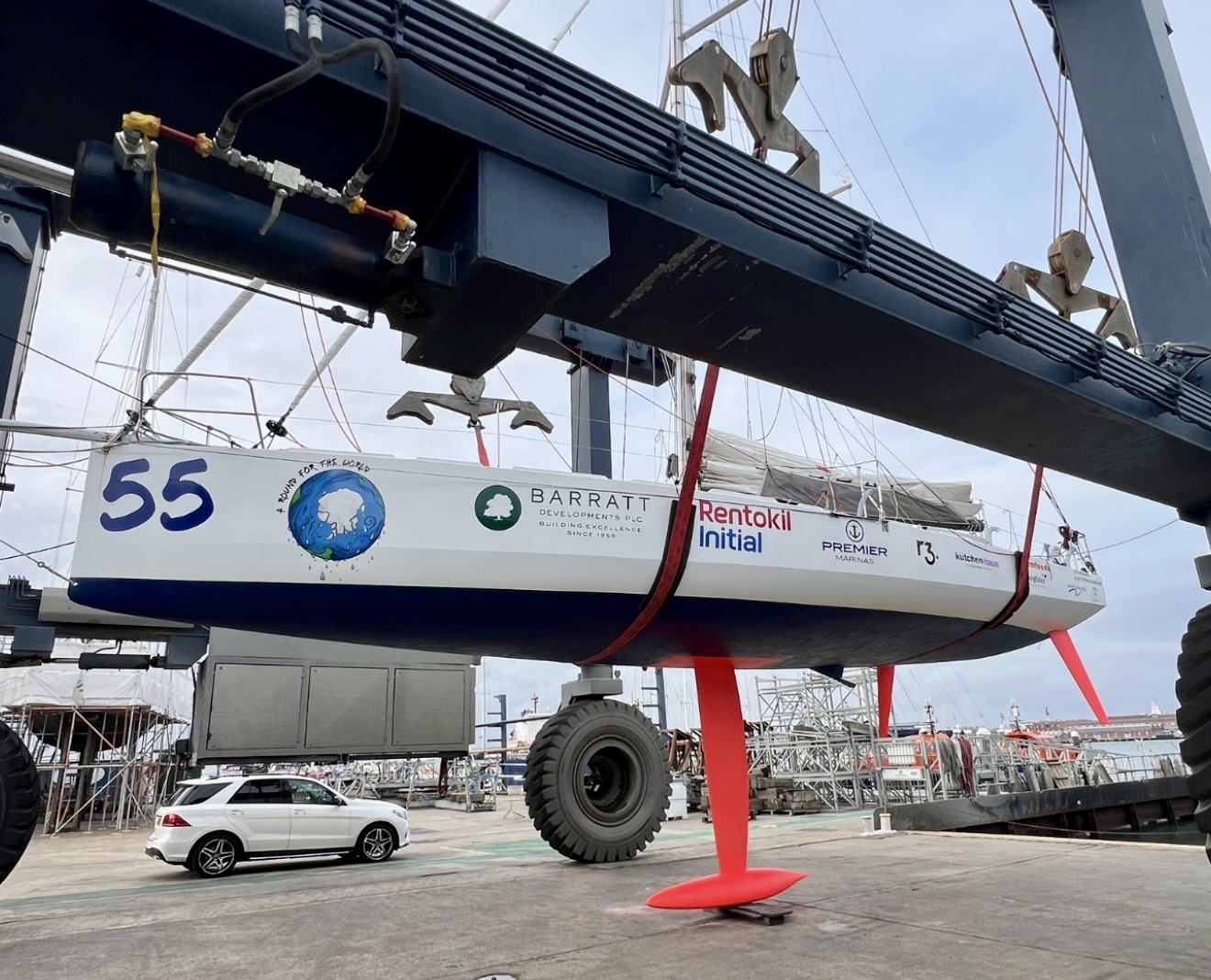 Class 40 race yacht in slings after global circumnavigation. A robust construction and sleek lines enhance speed and performance, making this a reliable and versatile platform for long-distance adventure. Perfect for  ocean passages, adventure sailing or fast blue water cruising now offered for sale.