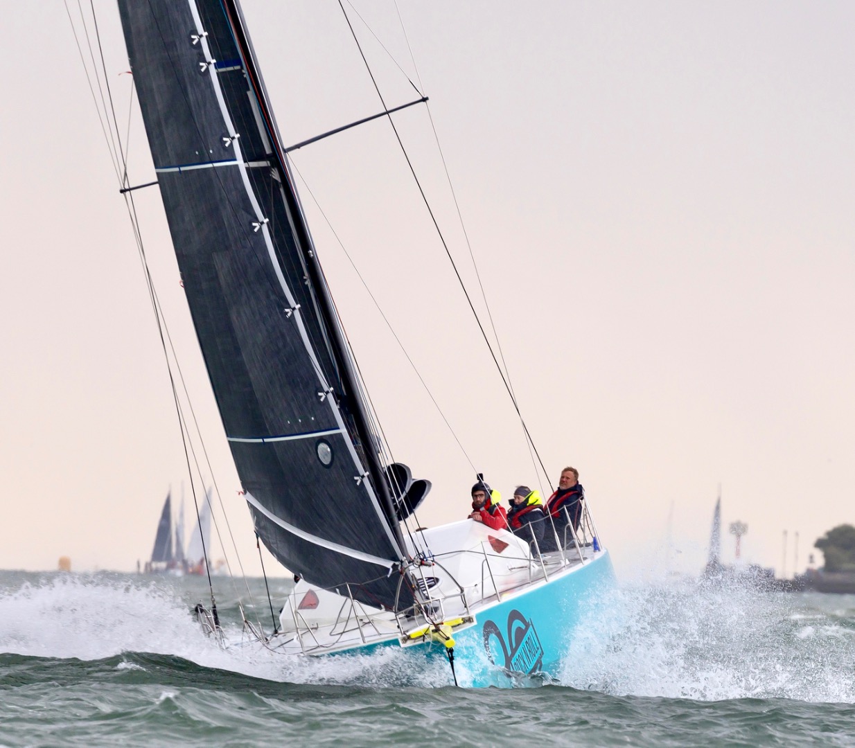 This Class 40 racing yacht for sale is pictured racing up wind with a full crew off Cowes. With carbon rig and carbon sail inventory and a Cat 0 safety certificate, she is also suitable for short-handed and offshore campaigns