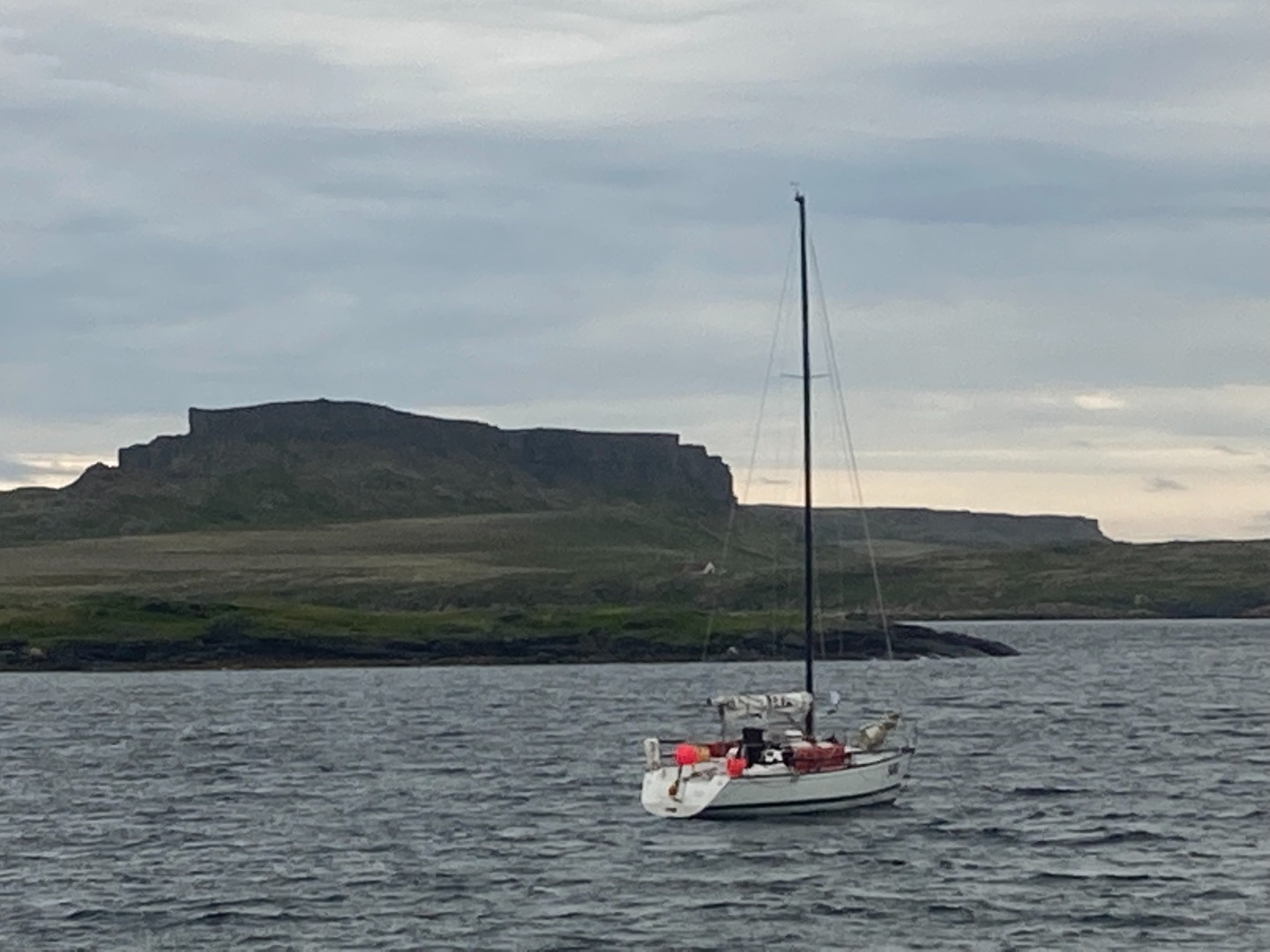 The 9m yacht Santana anchored off Fort York, Labrador during an expedition cruising from Greenland to Newfoundland undertaken by Ashley Perrin and Merfyn Owen for which they were awarded the 2023 Royal Cruising Club Trophy from the CCA.