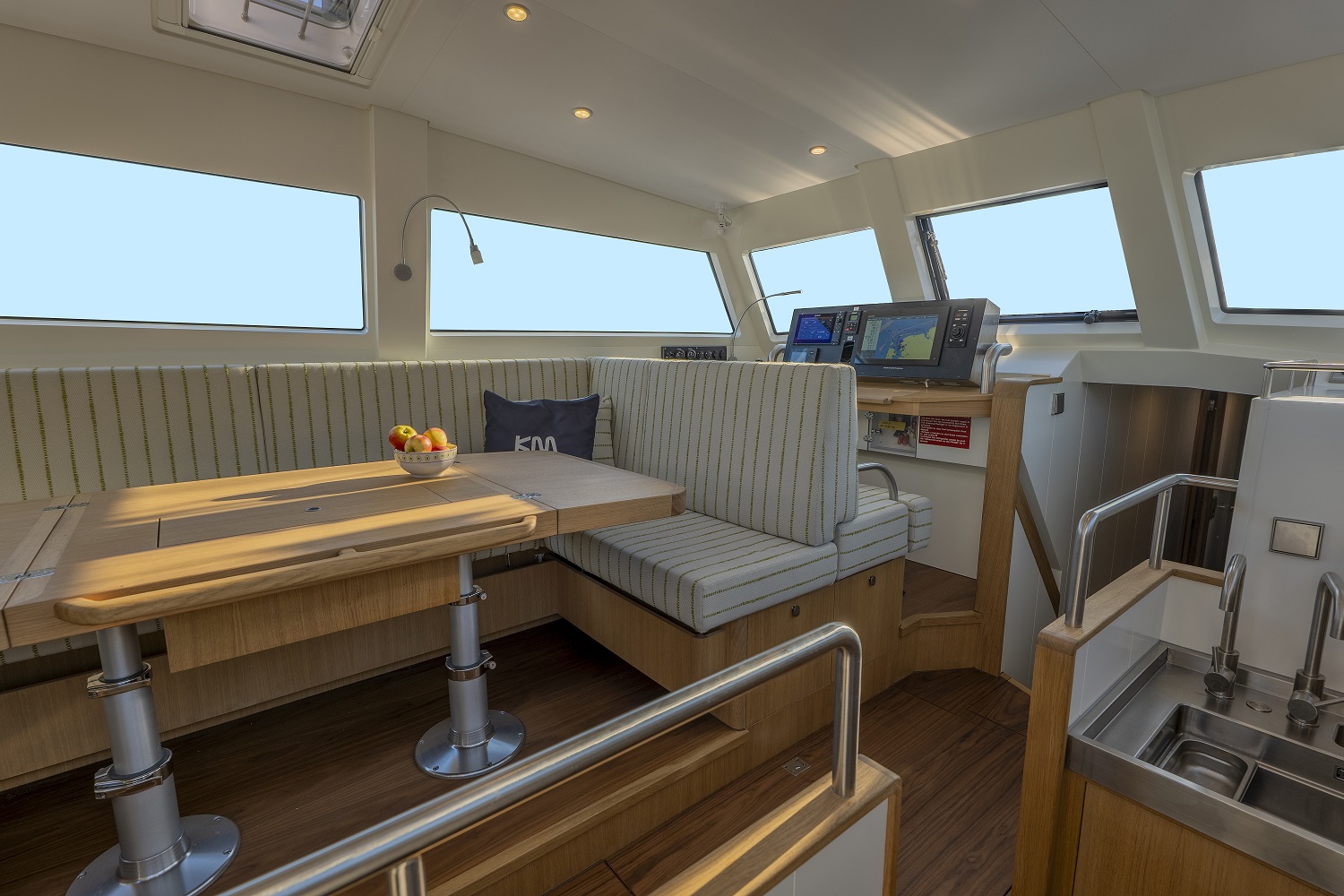 Owen Clarke are also the interior designers of this pilothouse saloon live aboard cruising boat design