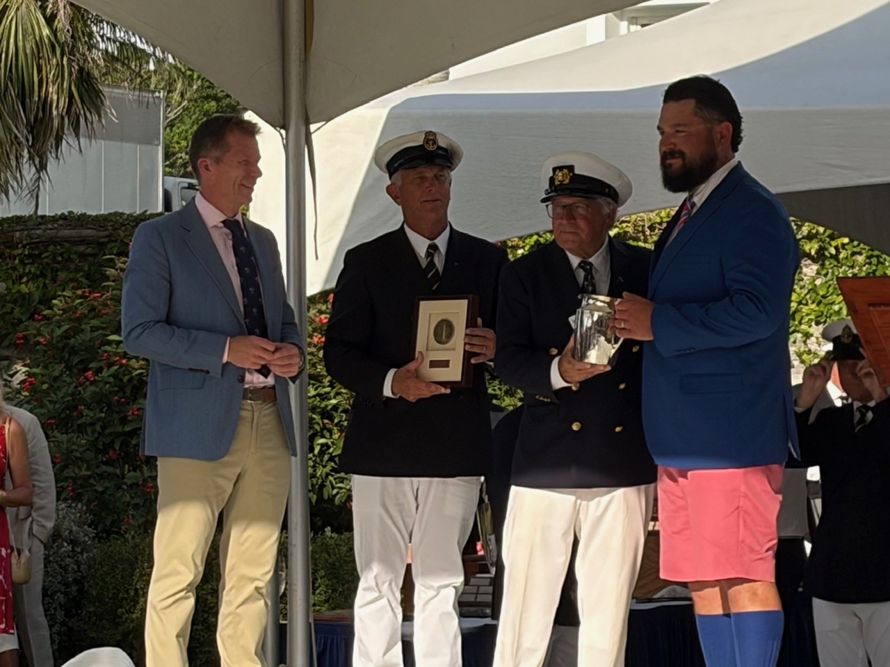 Classic yacht Gesture's boat captain collects winners trophy for St Davids Lighthouse Division 3 win 2026 Newport Bermuda Race