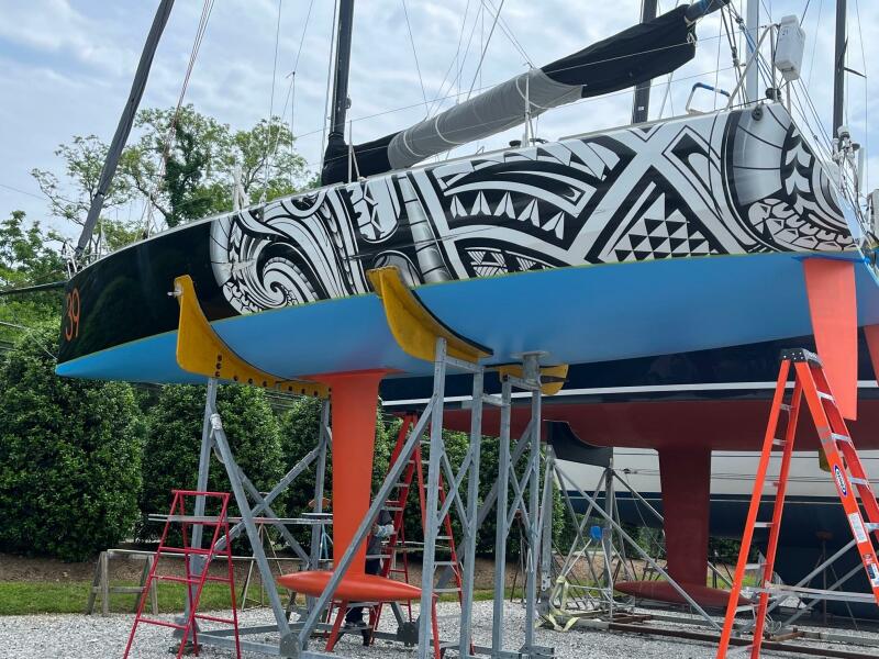 A proven offshore racing yacht, Class 40 Akilaria RC1 designed by Marc Lombard is for sale. Pictured ashore in her cradle with a deep keel and twin rudders. This reliable and robust dual-purpose boat  can be cruised in comfort or ideal for a round the world race such as Global Solo Challenge