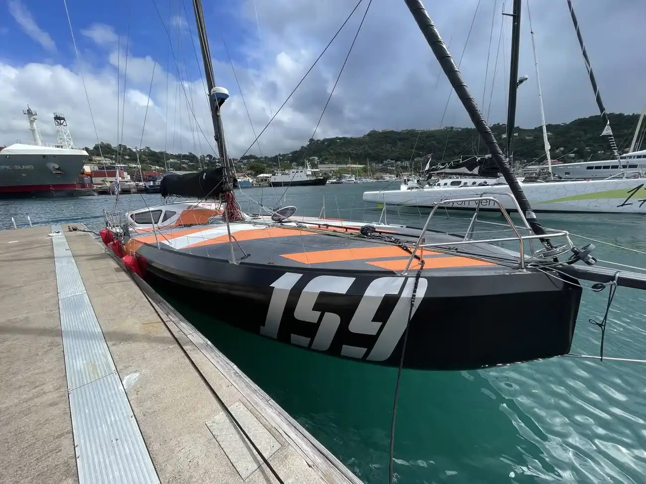 Class 40 high-performance Mach 40.4 scow bow ocean racing yacht, pictured on her berth. Her wide forward sections and fuller bow volume deliver exceptional stability, allowing her to carry greater sail area and translating into impressive performance, particularly when reaching and sailing downwind.