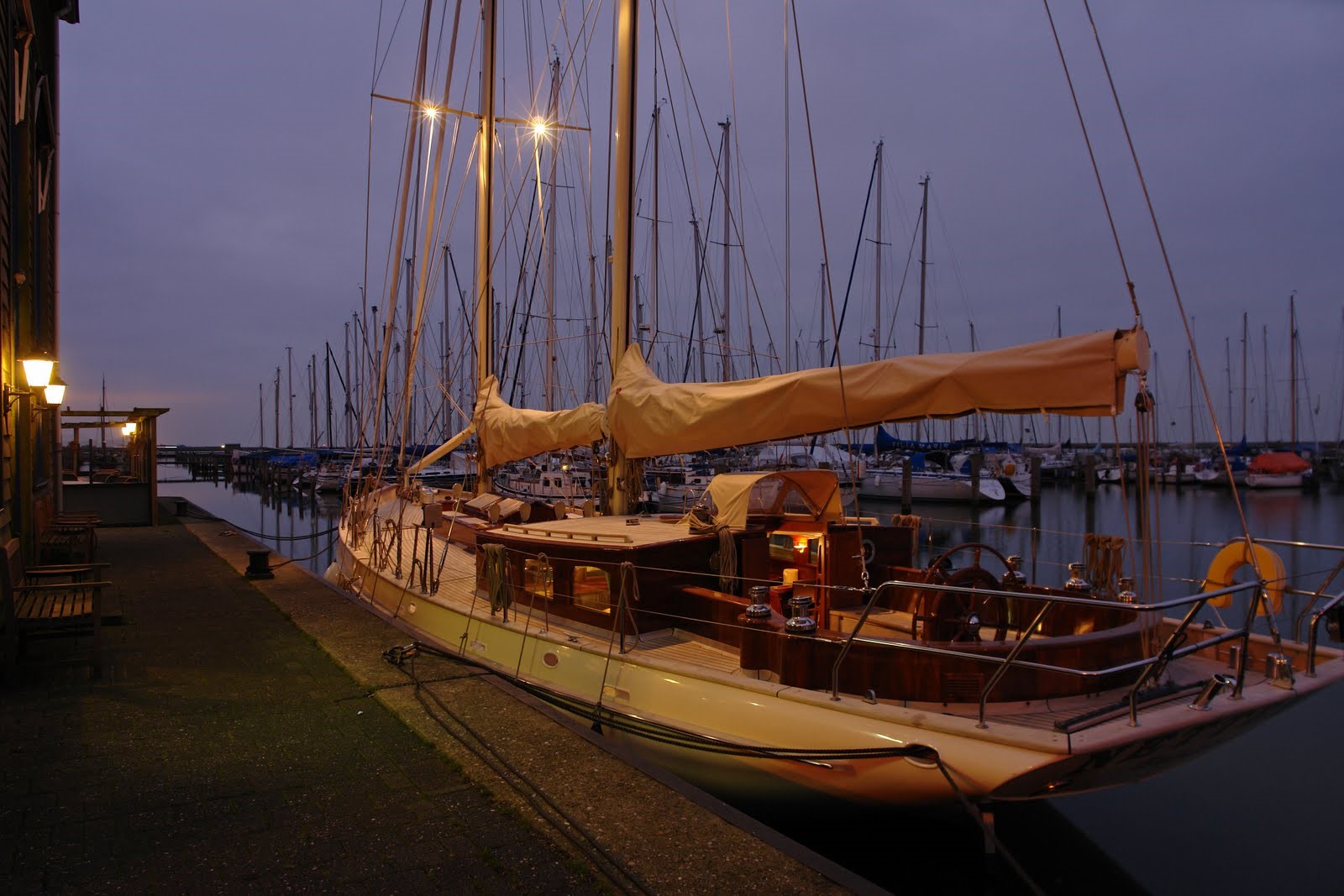 This picture shows the lifting keel, classic cruising yacht ‘Ahoy’ moored at port. She is enhanced for serious offshore cruising, and is available for sale through OC Performance Yacht Brokers. 