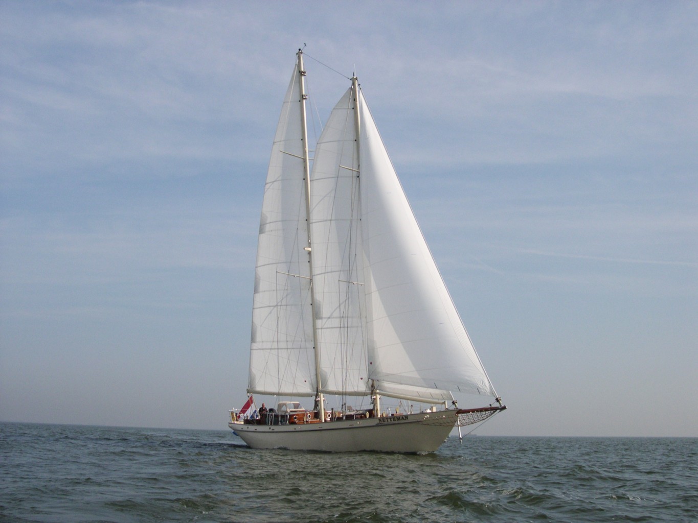 This is 'Ahoy' at anchor, the schooner rigged, classic cruising yacht. Designed by the renowned Dutch naval architect Olivier Van Meer and built at the V&O yachting facility in Holland in 2006, she is available for sale through OC Performance Yacht Brokers.