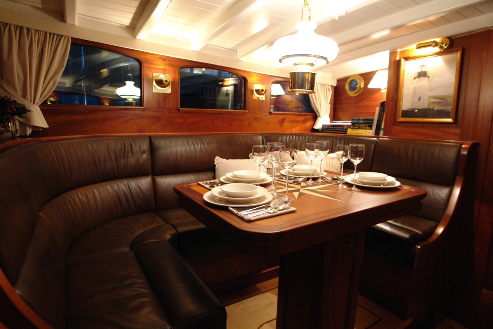 This is the main interior saloon of the classic cruising yacht, ‘Ahoy’. With a rich and warm mahogany panelled interior, maple flooring and plush leather soft furnishings, this schooner exudes comfort and is perfect for blue water and offshore cruising. 