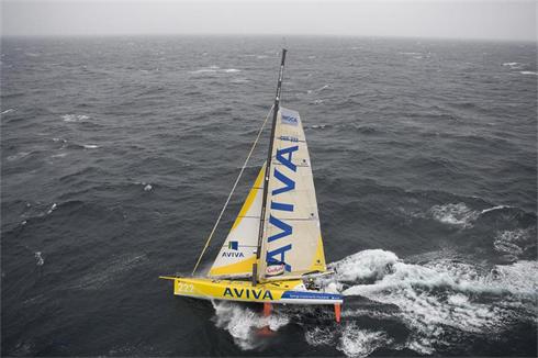 Pictures of Dee Caffari training at sea on board her IMOCA Open 60 
