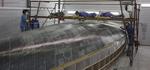 Laminating the hull bottom skins Laminating the hull bottom skins