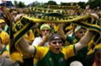 Australian soccer fans show their support for the Socceroos during a lunchtime event in the Sydney Domain November 17, 2005. The event enabled the Socceroos to thank supporters before returning overseas for club duties after Australia beat Uruguay 4-2 in a penalty shoot-out to qualify for next year's World Cup in Germany. REUTERS/Will Burgess
Picture Supplied by Action Images *** Local Caption *** 2005-11-17T043928Z_01_SYD04D_RTRIDSP_3_AUSTRALIA.jpg