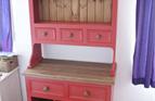 Red painted dresser with solid oak worktop and lower slats. Baskets in base.

£1250