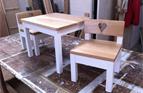 Scaled down dining table and chairs for two children with solid oak table top and seat bases and backs.

£500.