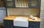 Dresser style unit featuring sink and tap installation, and halogen lights above.

£2250 inc sink taps and lights