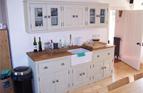 Large sink run with matching wall units with solid maple worktop and reclaimed belfast sink.

£2000 inc sink and taps.