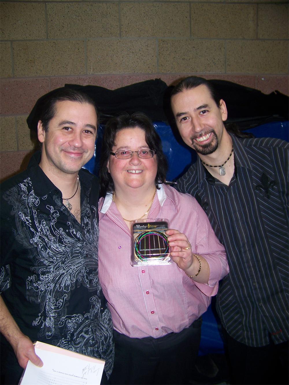 Del Castillo latin American band from Texas being presented with Wendy's strings