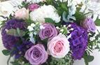 Cylinder centrepieces, private marquee.