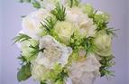 Summer white Bridal bouquet with herbs.